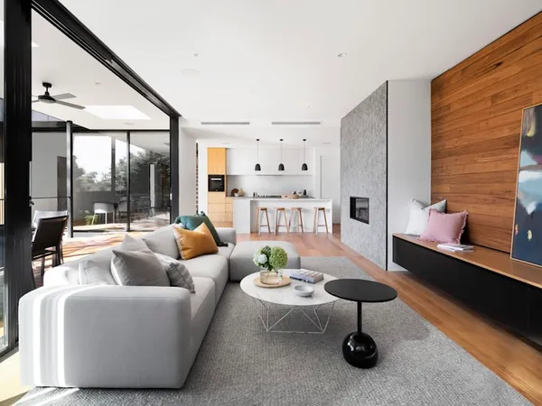 Modern courtyard with Mediterranean plantings and outdoor kitchen area